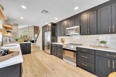 Welcome to this beautifully renovated 3-bedroom, 2.5-bath home on Tuscawilla Country Club in Florida - for sale on GolfHomes.com, golf home, golf lot