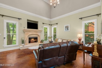 Nestled alongside the greens of the Pascagoula Country Club golf on Pascagoula Country Club in Mississippi - for sale on GolfHomes.com, golf home, golf lot