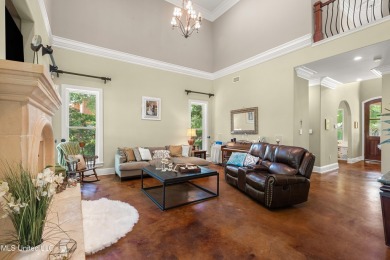 Nestled alongside the greens of the Pascagoula Country Club golf on Pascagoula Country Club in Mississippi - for sale on GolfHomes.com, golf home, golf lot