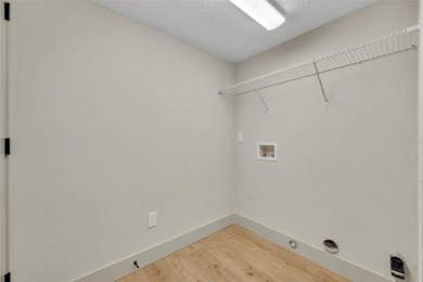 Welcome to this beautifully renovated 3-bedroom, 2.5-bath home on Tuscawilla Country Club in Florida - for sale on GolfHomes.com, golf home, golf lot