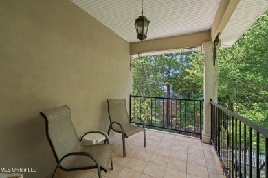 Nestled alongside the greens of the Pascagoula Country Club golf on Pascagoula Country Club in Mississippi - for sale on GolfHomes.com, golf home, golf lot