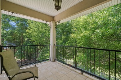 Nestled alongside the greens of the Pascagoula Country Club golf on Pascagoula Country Club in Mississippi - for sale on GolfHomes.com, golf home, golf lot