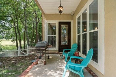 Nestled alongside the greens of the Pascagoula Country Club golf on Pascagoula Country Club in Mississippi - for sale on GolfHomes.com, golf home, golf lot