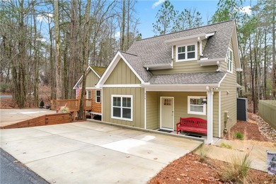 Recently built in 2024, this like new home is close to the North on The Highlands Course at Lake Arrowhead in Georgia - for sale on GolfHomes.com, golf home, golf lot