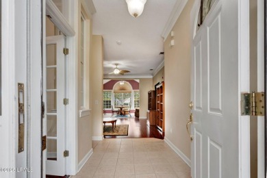 This 3-bedroom home with an office and a sunroom offers a split on Eagles Pointe Golf Club in South Carolina - for sale on GolfHomes.com, golf home, golf lot
