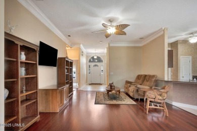 This 3-bedroom home with an office and a sunroom offers a split on Eagles Pointe Golf Club in South Carolina - for sale on GolfHomes.com, golf home, golf lot