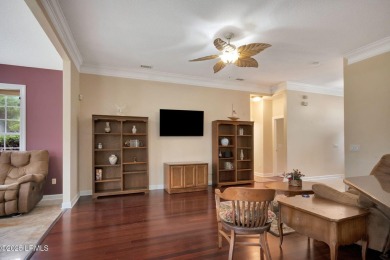 This 3-bedroom home with an office and a sunroom offers a split on Eagles Pointe Golf Club in South Carolina - for sale on GolfHomes.com, golf home, golf lot