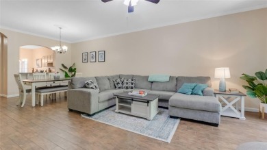 Experience the perfect blend of affordability and resort-style on Heritage Isles Golf and Country Club in Florida - for sale on GolfHomes.com, golf home, golf lot