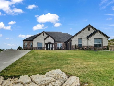 Welcome to this stunning, custom-built luxury home where on Canyon West Golf Club in Texas - for sale on GolfHomes.com, golf home, golf lot