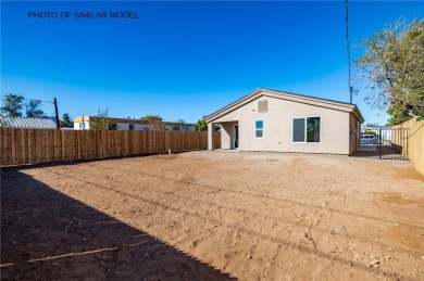 This BRAND NEW 2-bedroom 2 bath home is located in the quiet on Valle Vista Golf Course in Arizona - for sale on GolfHomes.com, golf home, golf lot