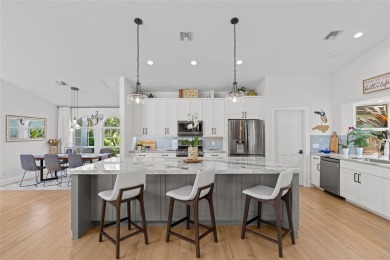 Experience the ultimate blend of luxury & aviation lifestyle in on The Wanderers Club in Florida - for sale on GolfHomes.com, golf home, golf lot