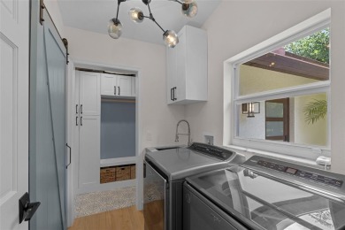 Experience the ultimate blend of luxury & aviation lifestyle in on The Wanderers Club in Florida - for sale on GolfHomes.com, golf home, golf lot