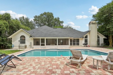 Updated POOL home in the gated community of Orange Park Country on Country Club of Orange Park in Florida - for sale on GolfHomes.com, golf home, golf lot