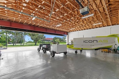 Experience the ultimate blend of luxury & aviation lifestyle in on The Wanderers Club in Florida - for sale on GolfHomes.com, golf home, golf lot