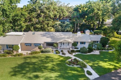 Just Steps from Lake Hollingsworth! Discover this exceptional 3 on Cleveland Heights Golf Course in Florida - for sale on GolfHomes.com, golf home, golf lot