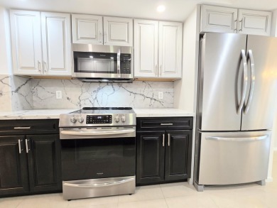 Spotless 55+ Abaco of Wynmoor home: Fully renovated & freshly on Wynmoor Golf Course in Florida - for sale on GolfHomes.com, golf home, golf lot