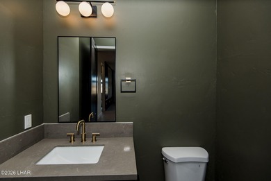 Experience modern luxury and energy-efficient living in this on Los Lagos Golf Club in Arizona - for sale on GolfHomes.com, golf home, golf lot