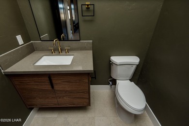 Experience modern luxury and energy-efficient living in this on Los Lagos Golf Club in Arizona - for sale on GolfHomes.com, golf home, golf lot