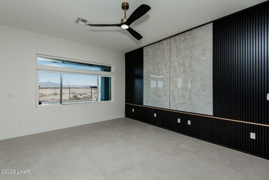 Experience modern luxury and energy-efficient living in this on Los Lagos Golf Club in Arizona - for sale on GolfHomes.com, golf home, golf lot
