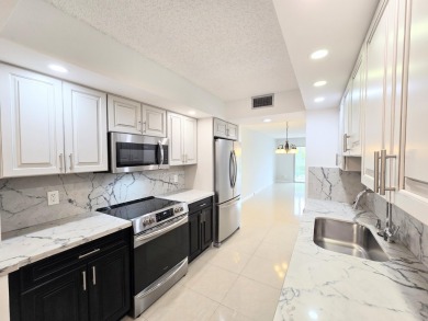 Spotless 55+ Abaco of Wynmoor home: Fully renovated & freshly on Wynmoor Golf Course in Florida - for sale on GolfHomes.com, golf home, golf lot