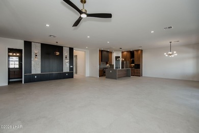 Experience modern luxury and energy-efficient living in this on Los Lagos Golf Club in Arizona - for sale on GolfHomes.com, golf home, golf lot