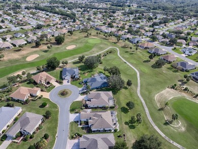 This stunning TURNKEY home in the highly sought-after Kingston on Eagle Ridge At Spruce Creek Country Club in Florida - for sale on GolfHomes.com, golf home, golf lot