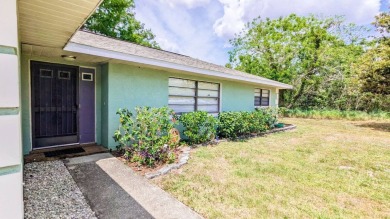Welcome to this beautifully maintained 2-bedroom, 2-bathroom on Placid Lakes Country Club in Florida - for sale on GolfHomes.com, golf home, golf lot