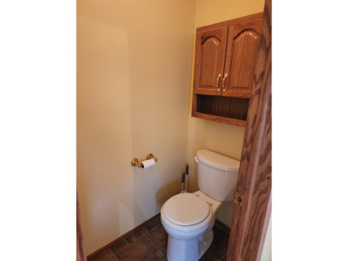 Don't miss this beautifully updated home in the highly on Dakota Dunes Country Club in South Dakota - for sale on GolfHomes.com, golf home, golf lot