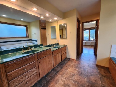 Don't miss this beautifully updated home in the highly on Dakota Dunes Country Club in South Dakota - for sale on GolfHomes.com, golf home, golf lot