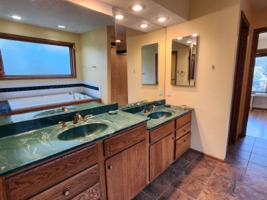Don't miss this beautifully updated home in the highly on Dakota Dunes Country Club in South Dakota - for sale on GolfHomes.com, golf home, golf lot