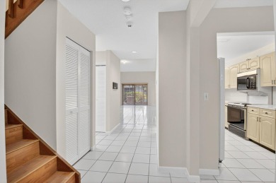 Nestled within a gated community, this 3 bedroom 2.5 bath on Boca Delray Golf and Country Club in Florida - for sale on GolfHomes.com, golf home, golf lot