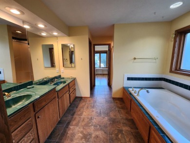 Don't miss this beautifully updated home in the highly on Dakota Dunes Country Club in South Dakota - for sale on GolfHomes.com, golf home, golf lot