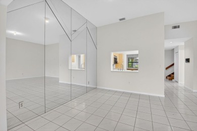 Nestled within a gated community, this 3 bedroom 2.5 bath on Boca Delray Golf and Country Club in Florida - for sale on GolfHomes.com, golf home, golf lot