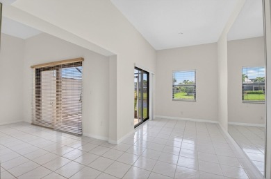 Nestled within a gated community, this 3 bedroom 2.5 bath on Boca Delray Golf and Country Club in Florida - for sale on GolfHomes.com, golf home, golf lot