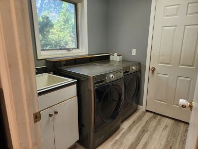 Don't miss this beautifully updated home in the highly on Dakota Dunes Country Club in South Dakota - for sale on GolfHomes.com, golf home, golf lot