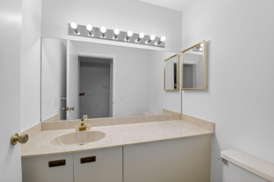 Nestled within a gated community, this 3 bedroom 2.5 bath on Boca Delray Golf and Country Club in Florida - for sale on GolfHomes.com, golf home, golf lot