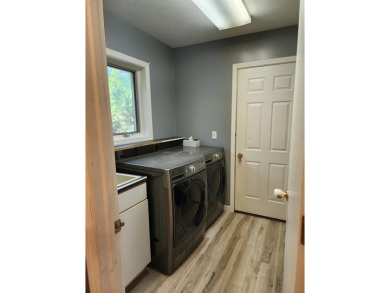 Don't miss this beautifully updated home in the highly on Dakota Dunes Country Club in South Dakota - for sale on GolfHomes.com, golf home, golf lot