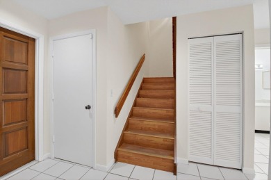 Nestled within a gated community, this 3 bedroom 2.5 bath on Boca Delray Golf and Country Club in Florida - for sale on GolfHomes.com, golf home, golf lot
