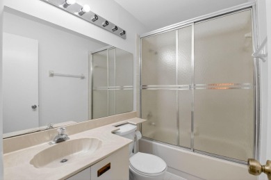 Nestled within a gated community, this 3 bedroom 2.5 bath on Boca Delray Golf and Country Club in Florida - for sale on GolfHomes.com, golf home, golf lot