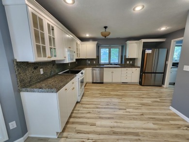 Don't miss this beautifully updated home in the highly on Dakota Dunes Country Club in South Dakota - for sale on GolfHomes.com, golf home, golf lot