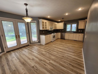 Don't miss this beautifully updated home in the highly on Dakota Dunes Country Club in South Dakota - for sale on GolfHomes.com, golf home, golf lot