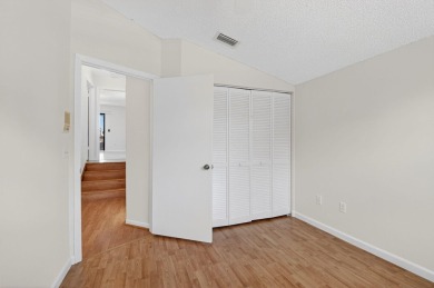Nestled within a gated community, this 3 bedroom 2.5 bath on Boca Delray Golf and Country Club in Florida - for sale on GolfHomes.com, golf home, golf lot