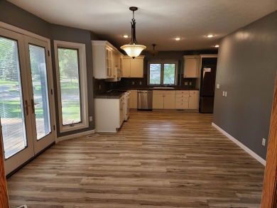Don't miss this beautifully updated home in the highly on Dakota Dunes Country Club in South Dakota - for sale on GolfHomes.com, golf home, golf lot