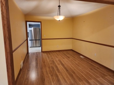 Don't miss this beautifully updated home in the highly on Dakota Dunes Country Club in South Dakota - for sale on GolfHomes.com, golf home, golf lot