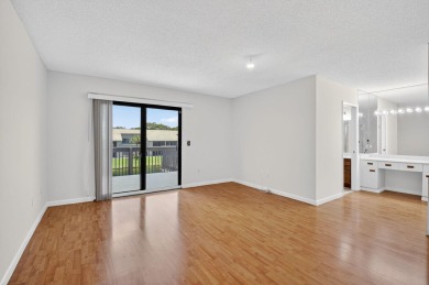 Nestled within a gated community, this 3 bedroom 2.5 bath on Boca Delray Golf and Country Club in Florida - for sale on GolfHomes.com, golf home, golf lot