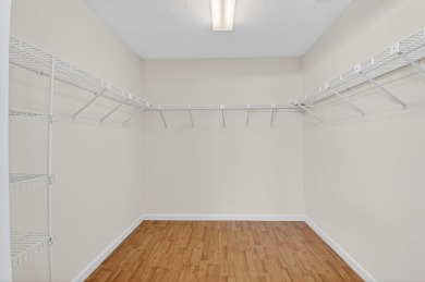 Nestled within a gated community, this 3 bedroom 2.5 bath on Boca Delray Golf and Country Club in Florida - for sale on GolfHomes.com, golf home, golf lot