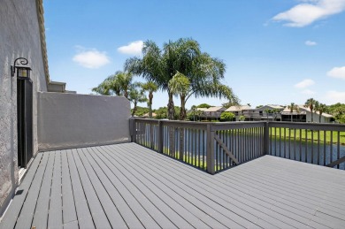 Nestled within a gated community, this 3 bedroom 2.5 bath on Boca Delray Golf and Country Club in Florida - for sale on GolfHomes.com, golf home, golf lot