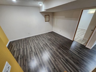 Don't miss this beautifully updated home in the highly on Dakota Dunes Country Club in South Dakota - for sale on GolfHomes.com, golf home, golf lot