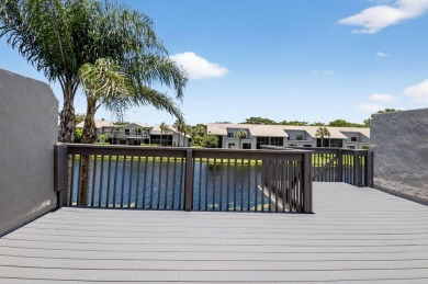 Nestled within a gated community, this 3 bedroom 2.5 bath on Boca Delray Golf and Country Club in Florida - for sale on GolfHomes.com, golf home, golf lot
