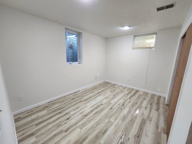 Don't miss this beautifully updated home in the highly on Dakota Dunes Country Club in South Dakota - for sale on GolfHomes.com, golf home, golf lot
